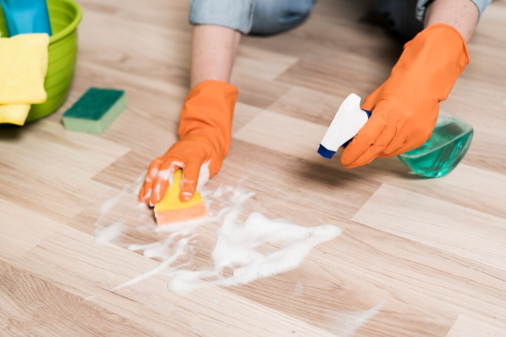 high-angle-woman-cleaning-floors_23-2148465020